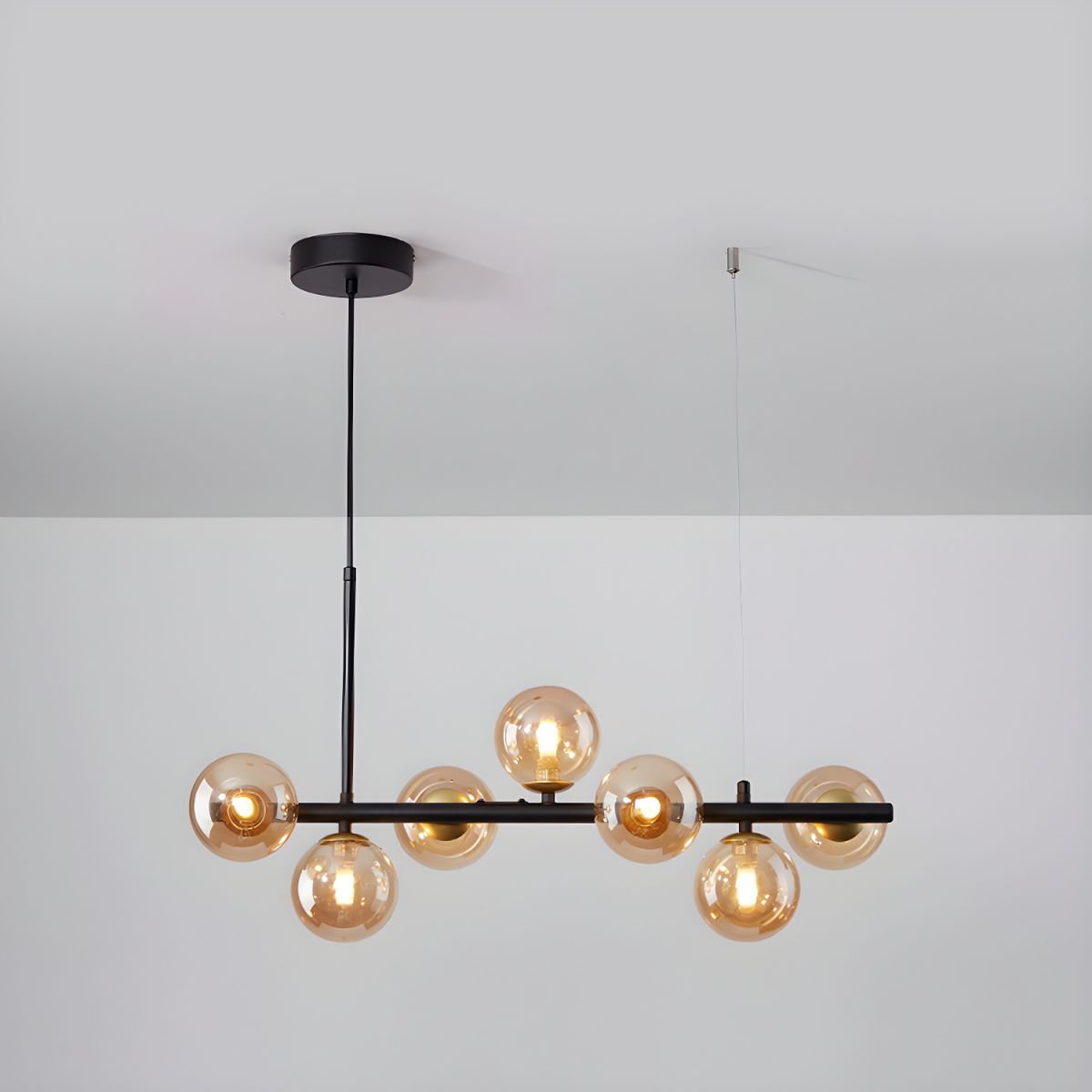 Aurelia Globe Chandelier 7-balls: ∅ 25.6″ x H 9.4″ / Black / Amber 1001 Chandelier