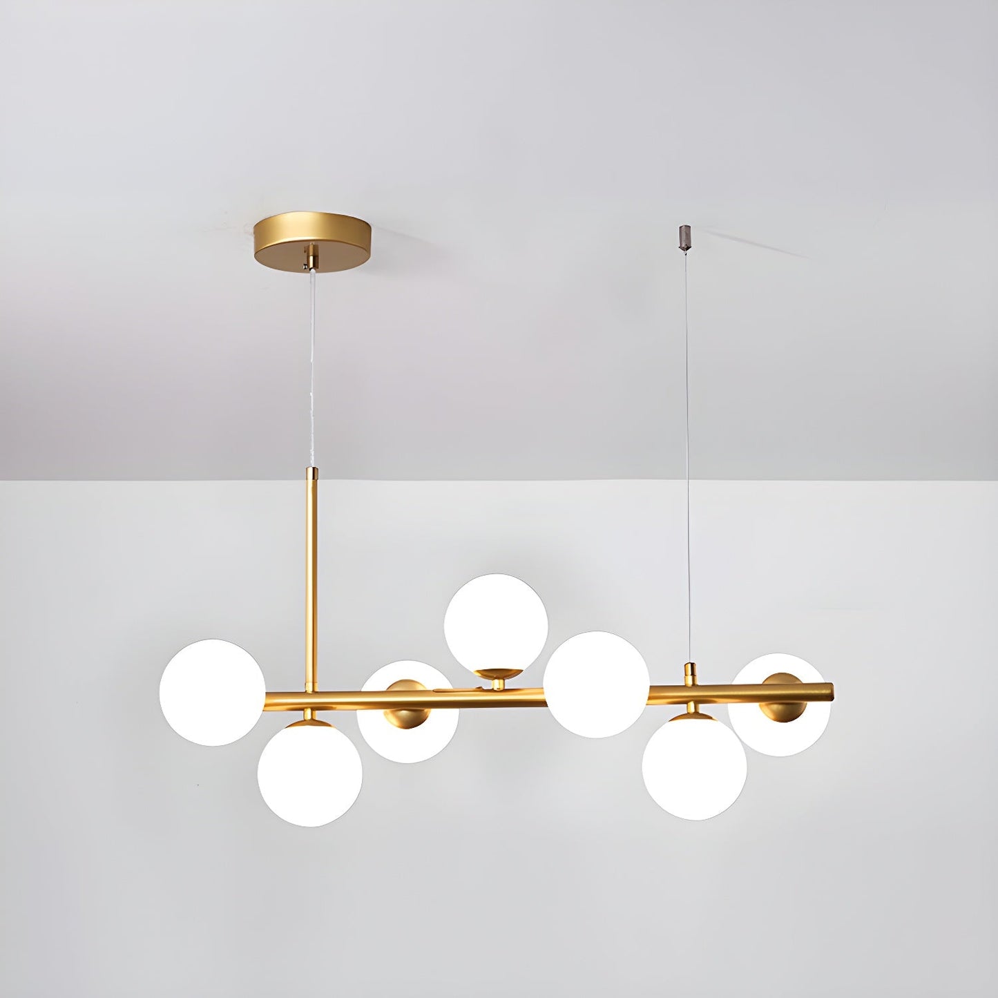 Aurelia Globe Chandelier 7-balls: ∅ 25.6″ x H 9.4″ / Gold / Milk White 1001 Chandelier