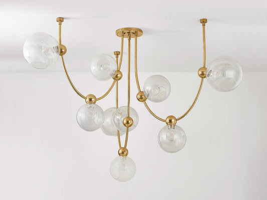 Corbett Lighting 9-Light Astraia Chandelier in Vintage Brass with Remolino Blanco Glass