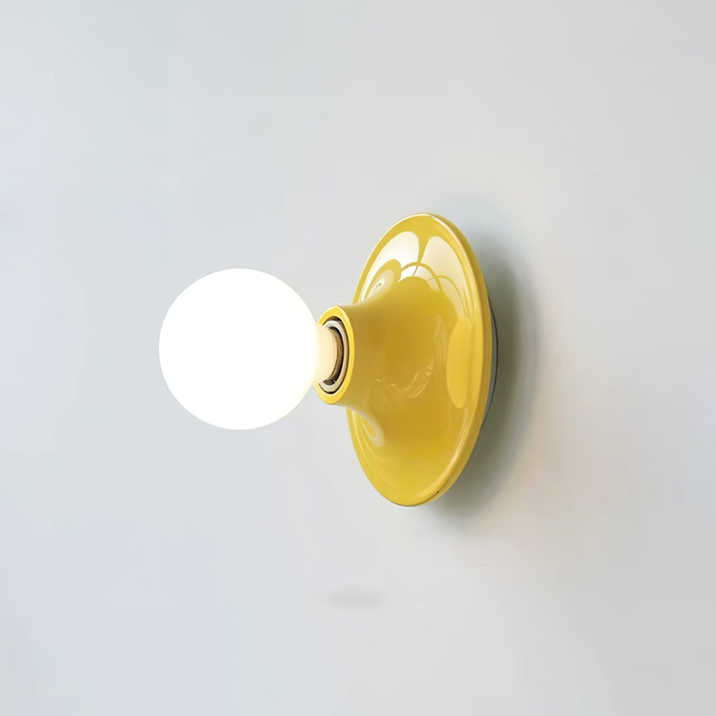 Eclipta Wall Sconce ∅ 5.9″ x H 5.9″ (White glass bulb) / Yellow