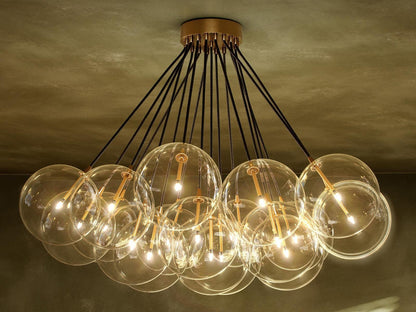 Four Hands Schwung Cloud 19-Light Chandelier in Burnished Brass and Clear Glass
