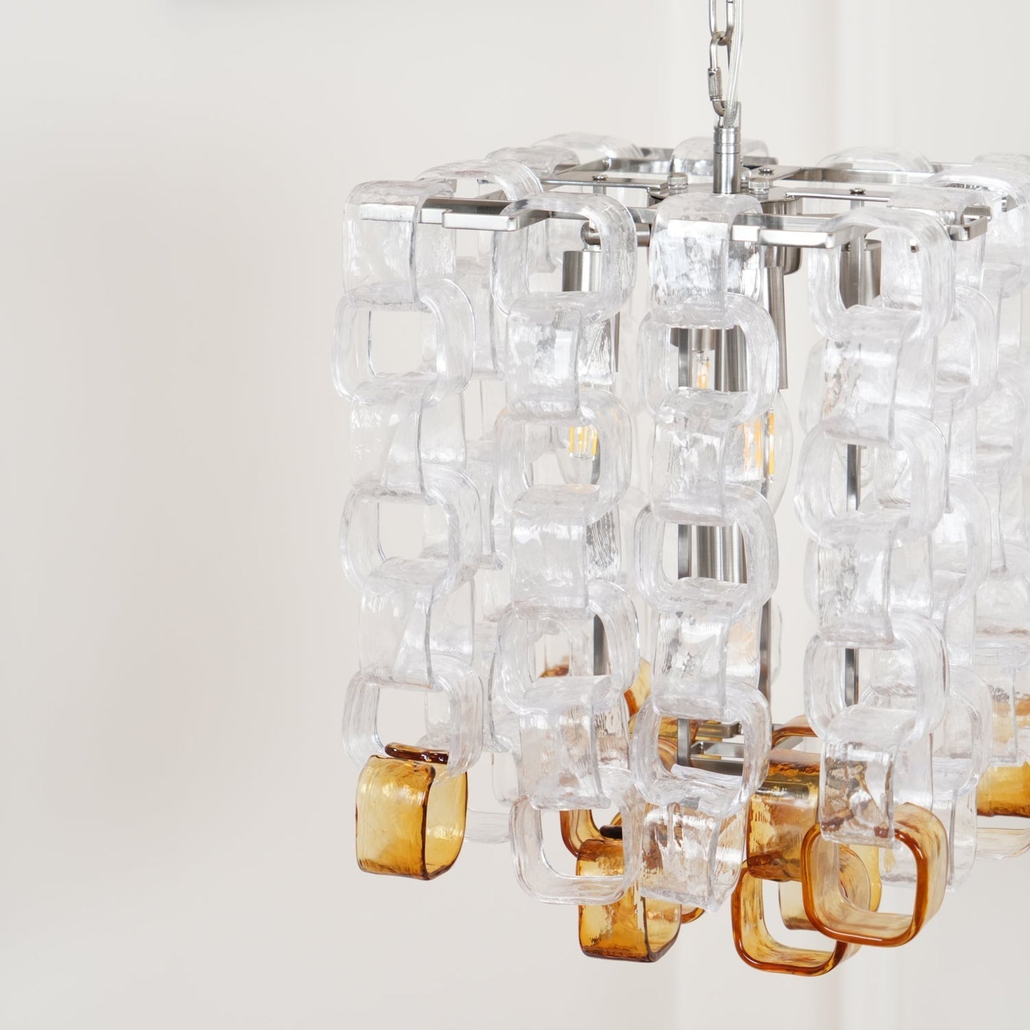 Murano Poliarte Interlocking Chandelier ∅ 12.6″ x H 16.1″ / Clear & Amber & Chrome Chandelier