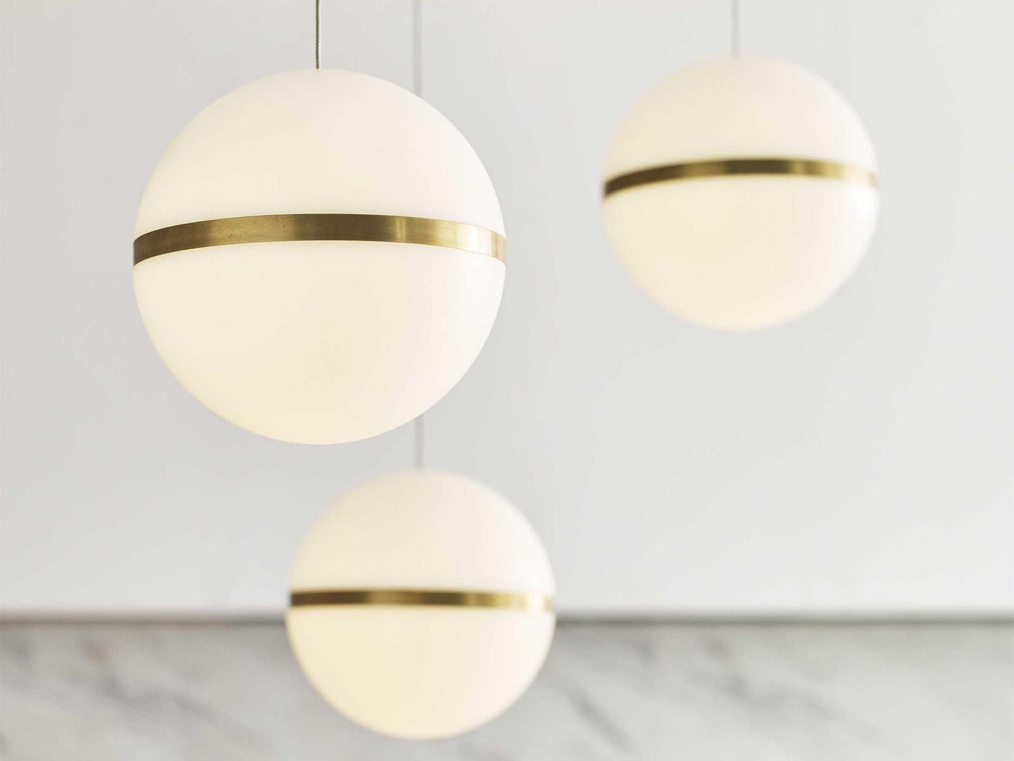 Visual Comfort Modern Hanea 9-Light LED Linear Chandelier in Natural Brass